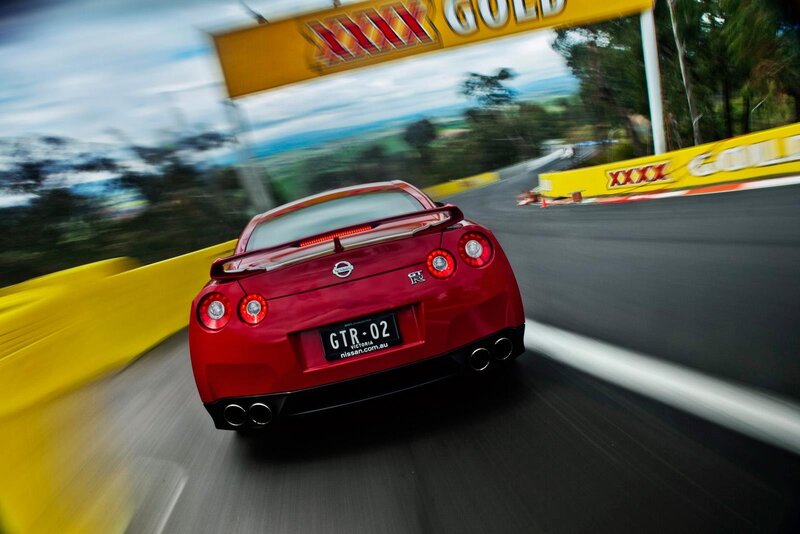 Red Nissan GT-R on a racetrack