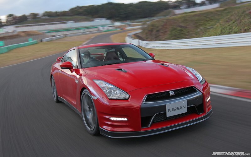 Red Nissan GT-R on a racetrack