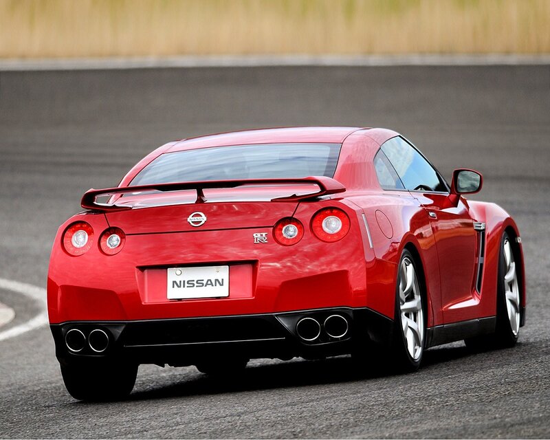 Red Nissan GT-R on a racetrack