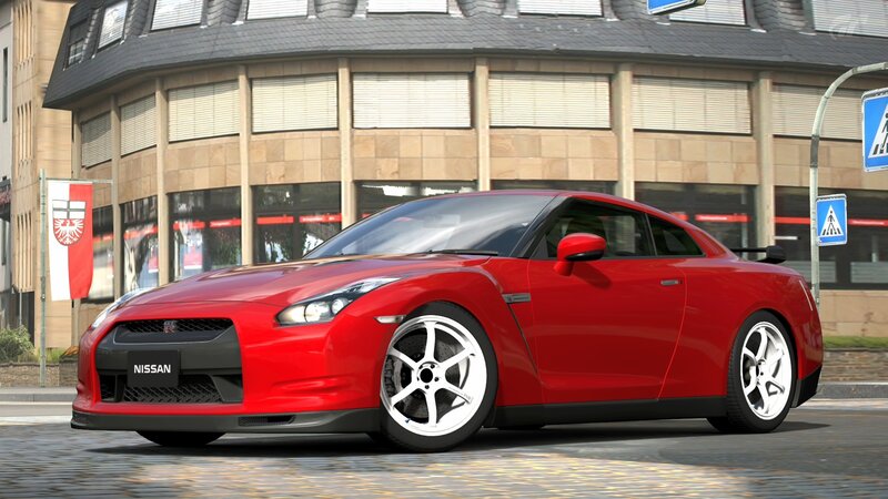 Red Nissan GT-R on city street