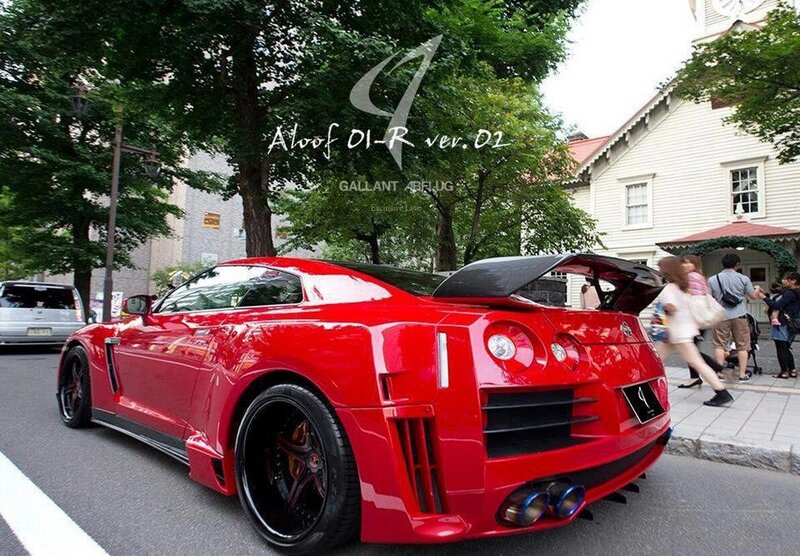 Red Nissan GT-R on city street