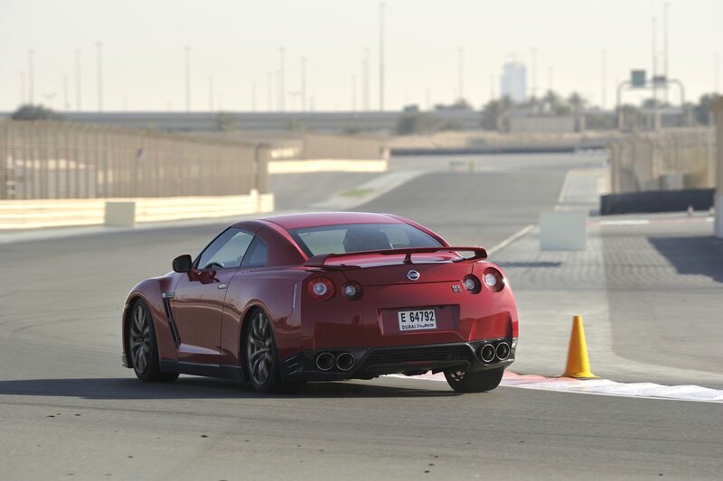 Red Nissan GT-R on racetrack