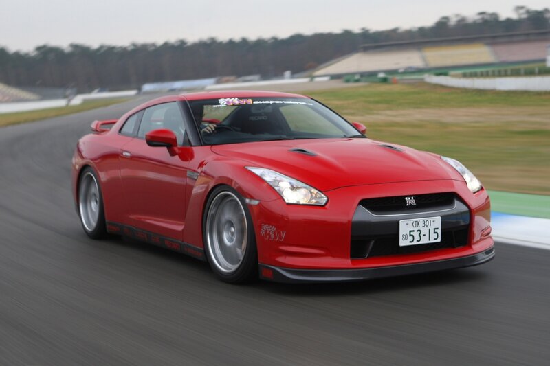 Red Nissan GT-R on racetrack