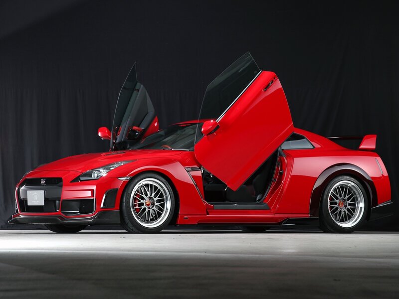 Red Nissan GT-R with doors open