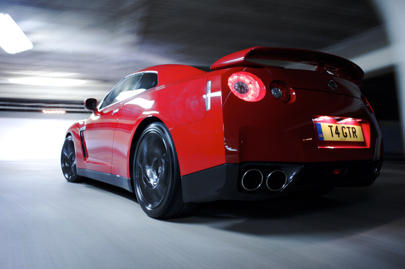 Red Nissan GTR in motion