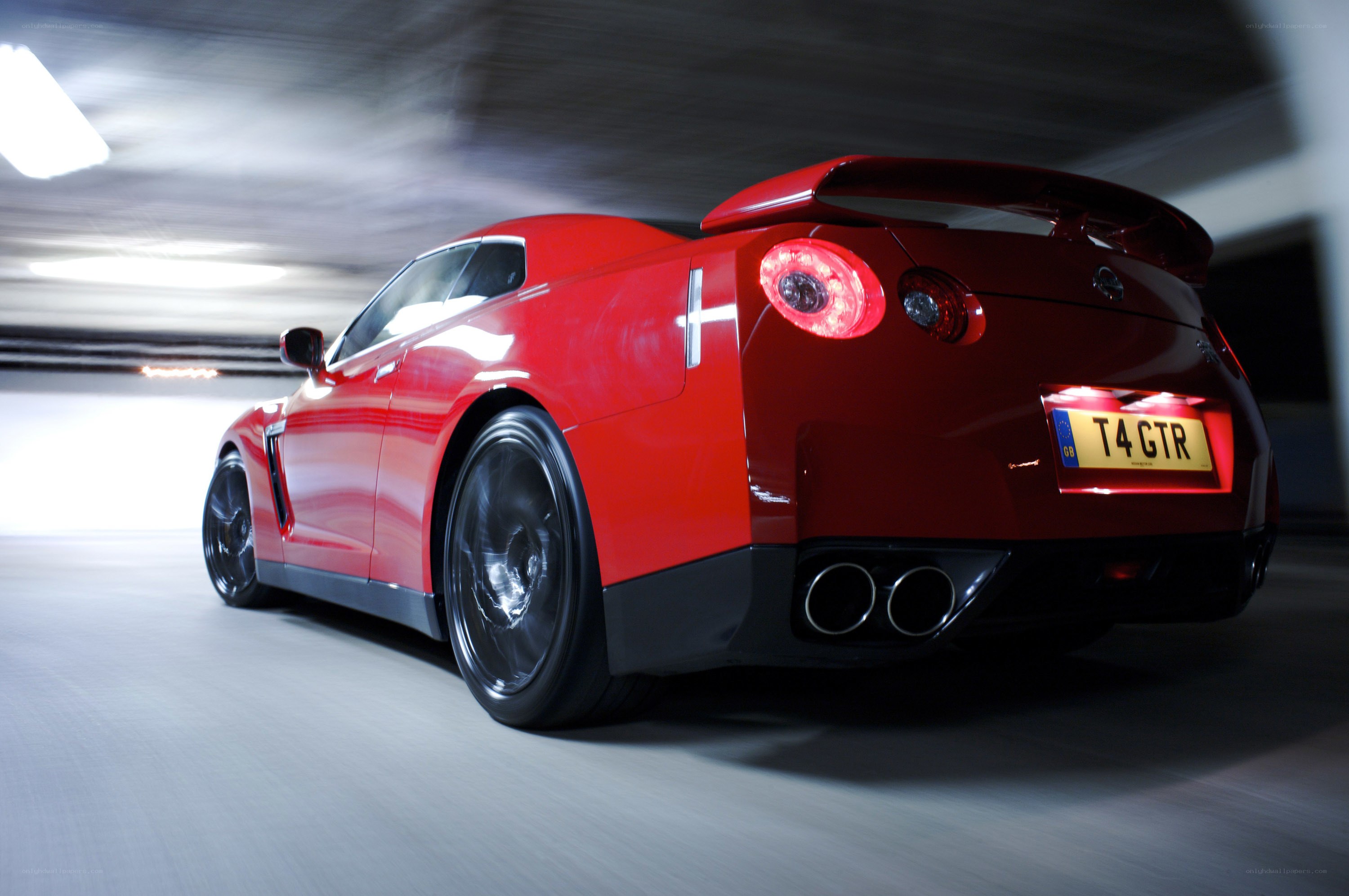 Red Nissan GTR in motion