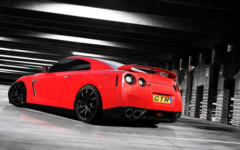 Red Nissan GTR in parking garage
