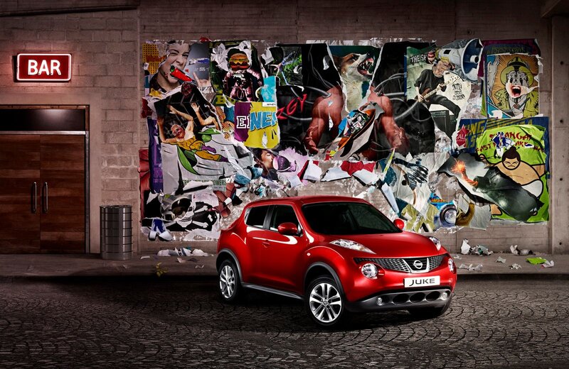 Red Nissan Juke in urban setting