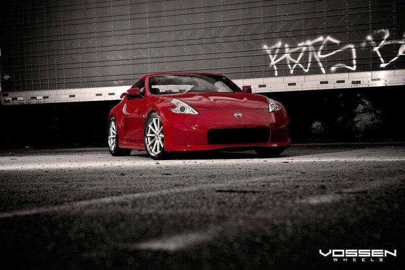 Red Nissan sports car in urban setting