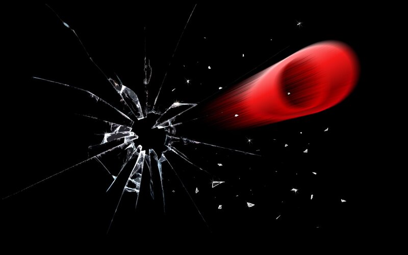 Red object shattering glass