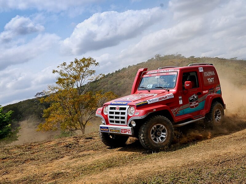 Red Off-road Vehicle — Dynamic, Afternoon, Photograph, Dirt Road