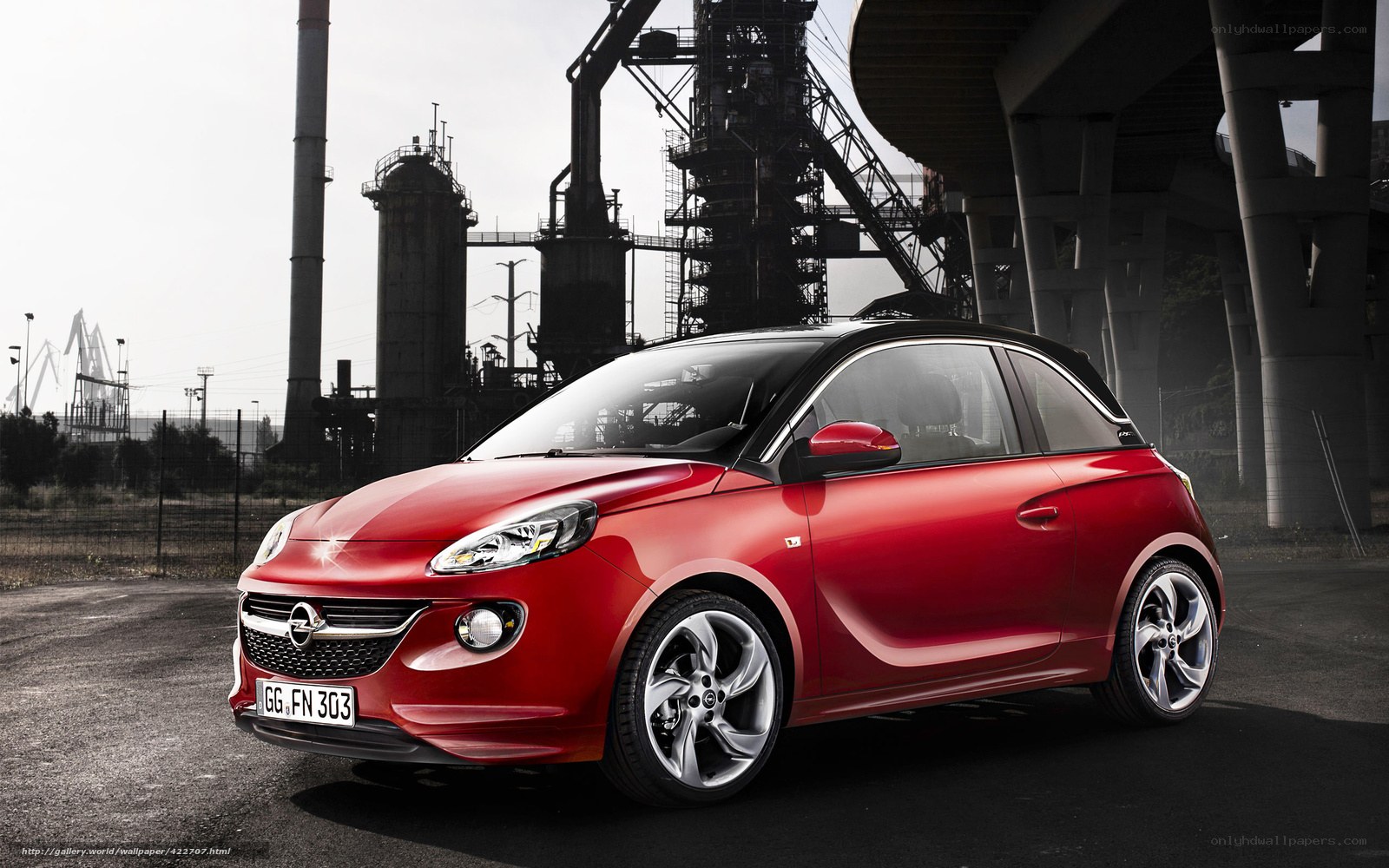Red Opel Adam in industrial setting