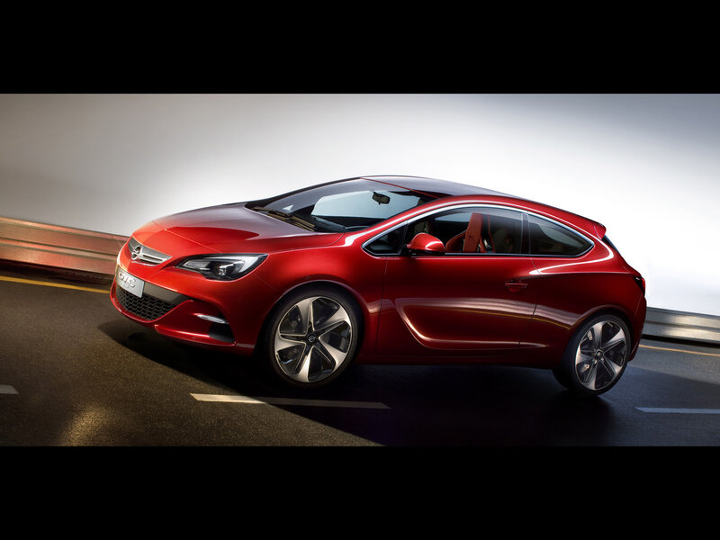 Red Opel Astra hatchback