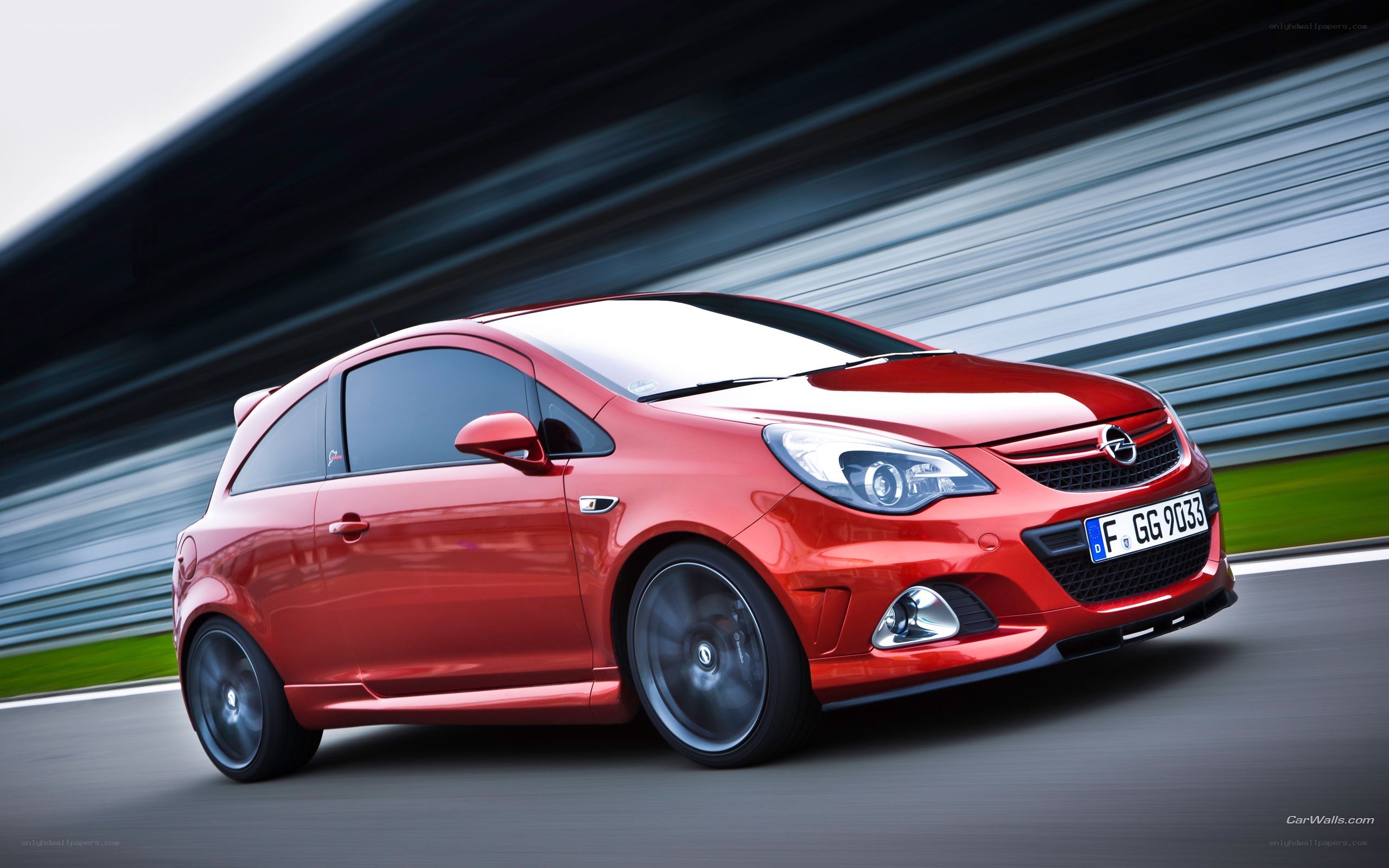 red opel corsa in motion