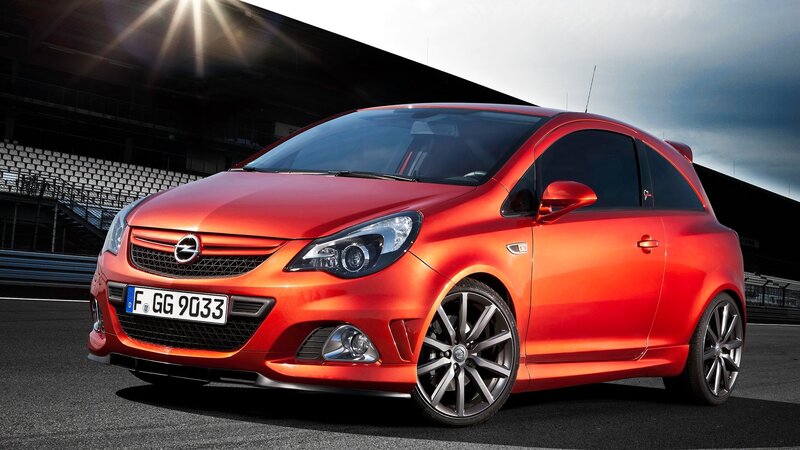 Red Opel Corsa on a racetrack