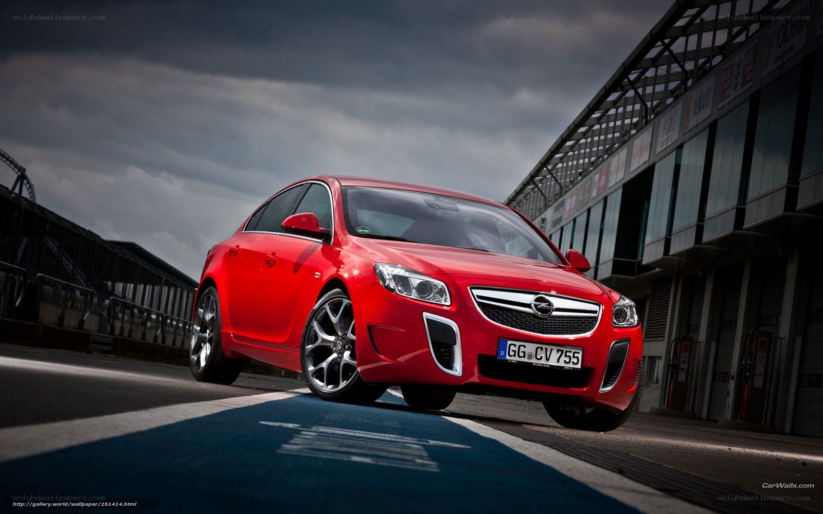 Red Opel Insignia on a racetrack