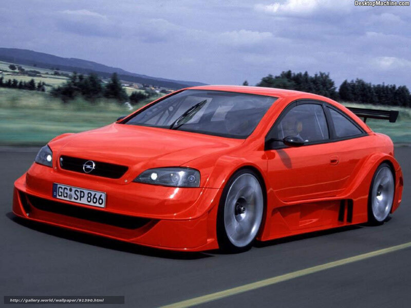 Red Opel race car on track