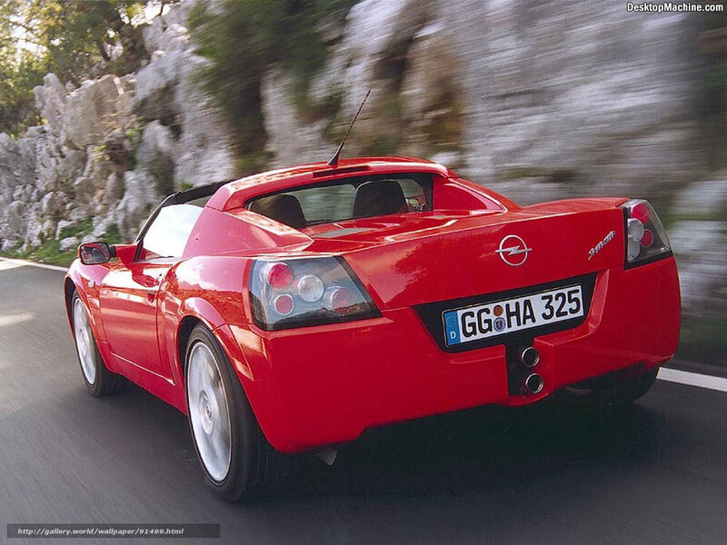 red opel speedster driving