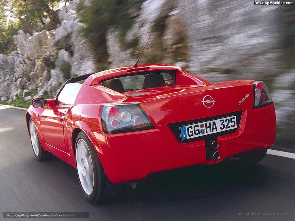 red opel speedster driving