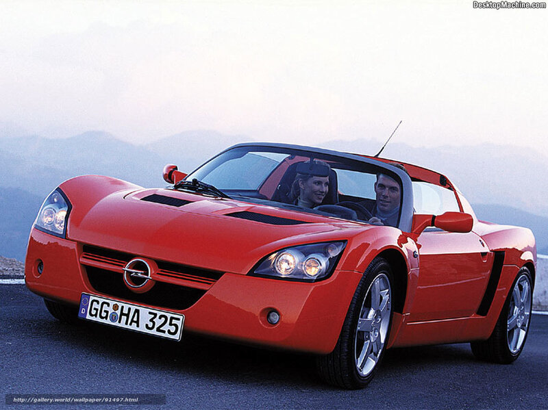 Red Opel Speedster on mountain road