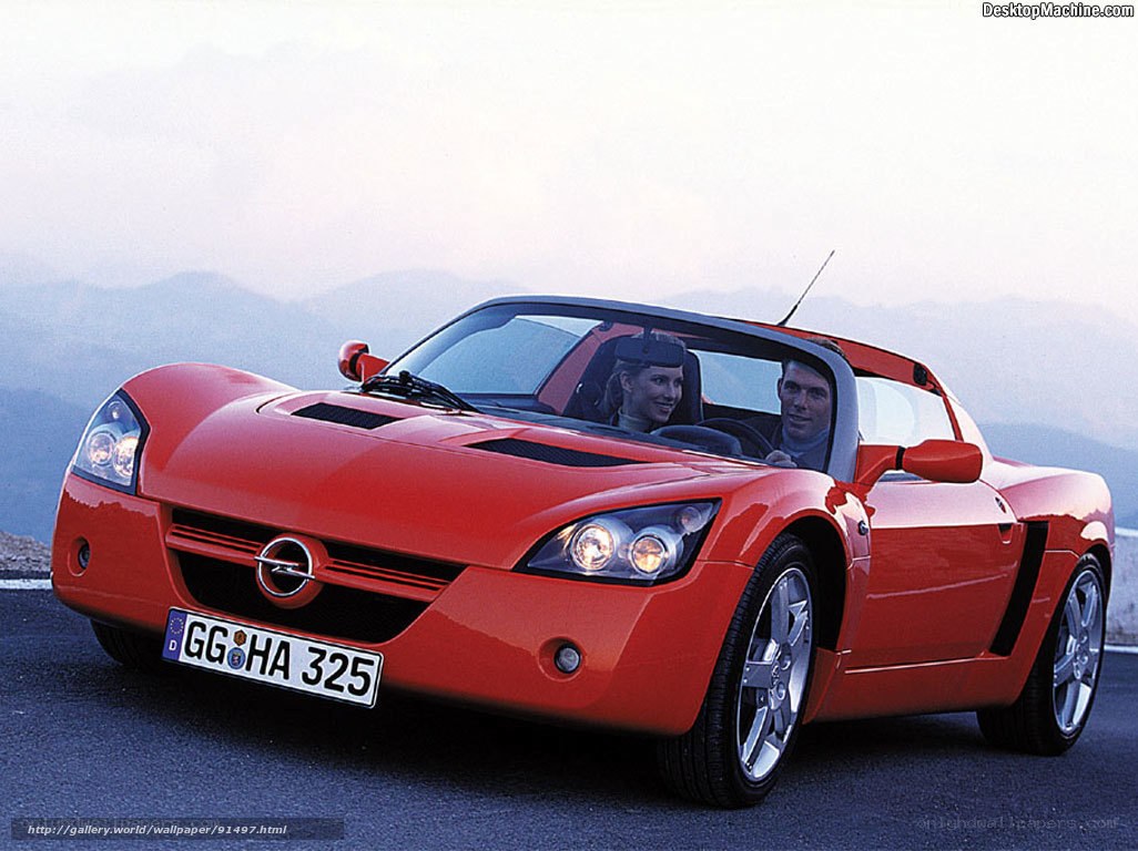Red Opel Speedster on mountain road