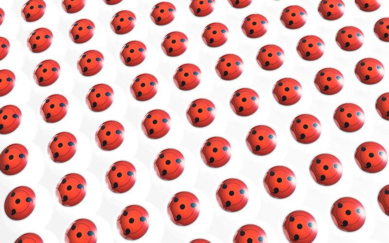 red orbs with black dots pattern