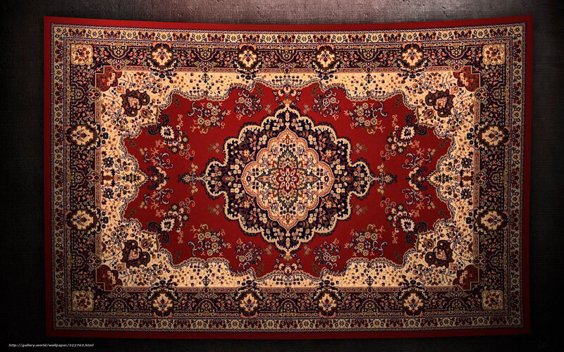 red oriental rug with intricate patterns