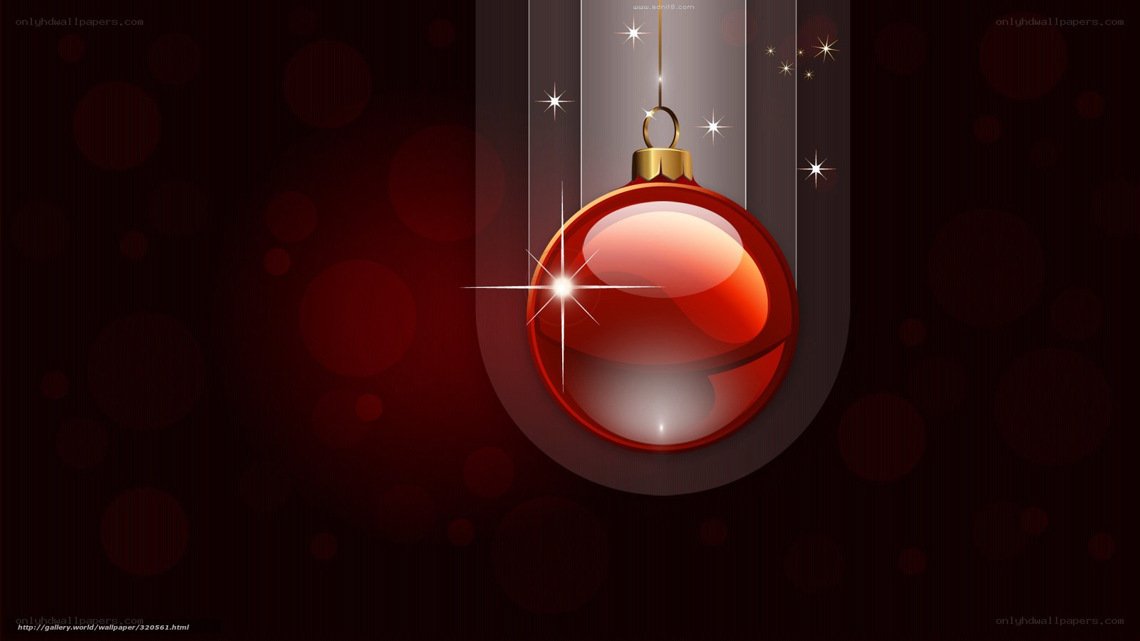 Red ornament hanging on dark background