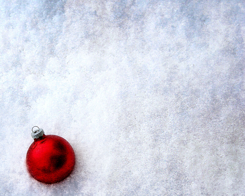 Red ornament in snow