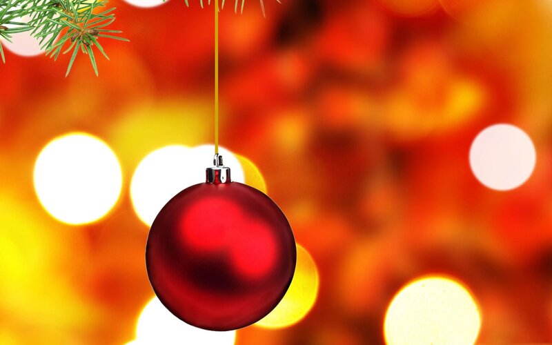Red ornament on Christmas tree