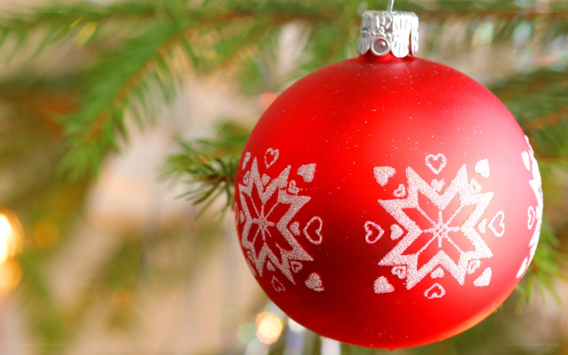 Red ornament on Christmas tree