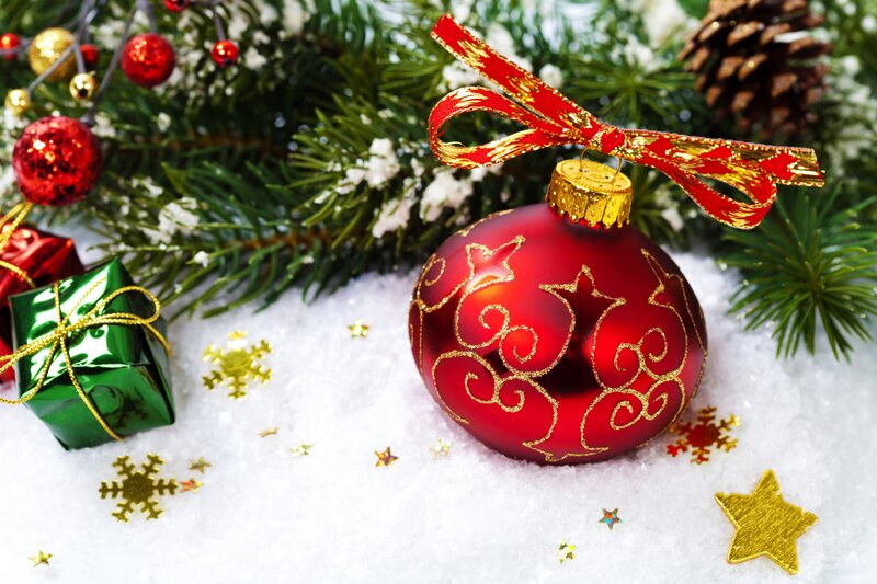 Red Ornament on Snow — Festive, Winter, Photograph