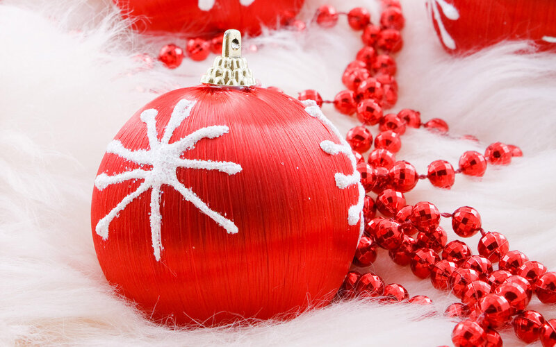 Red Ornament on White Fur — Festive, Winter