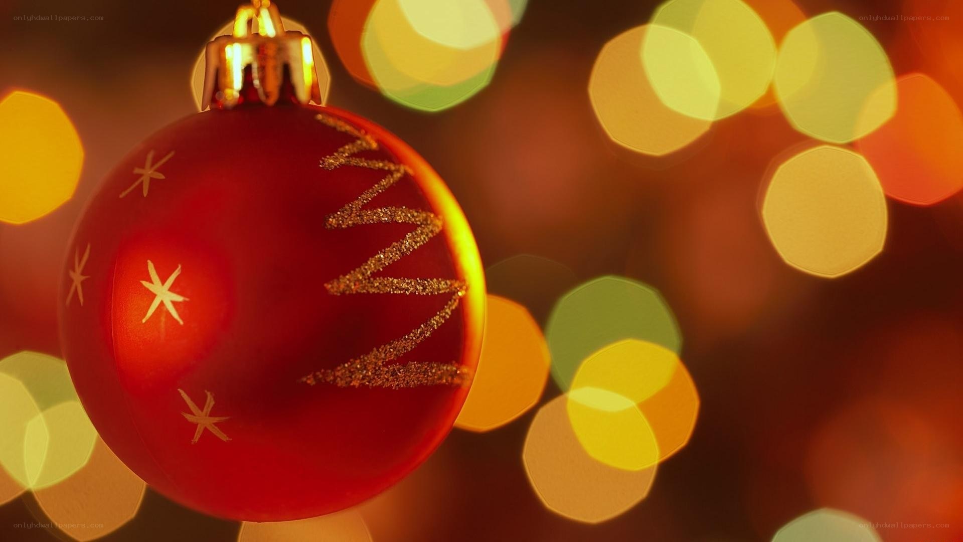 red ornament with bokeh lights