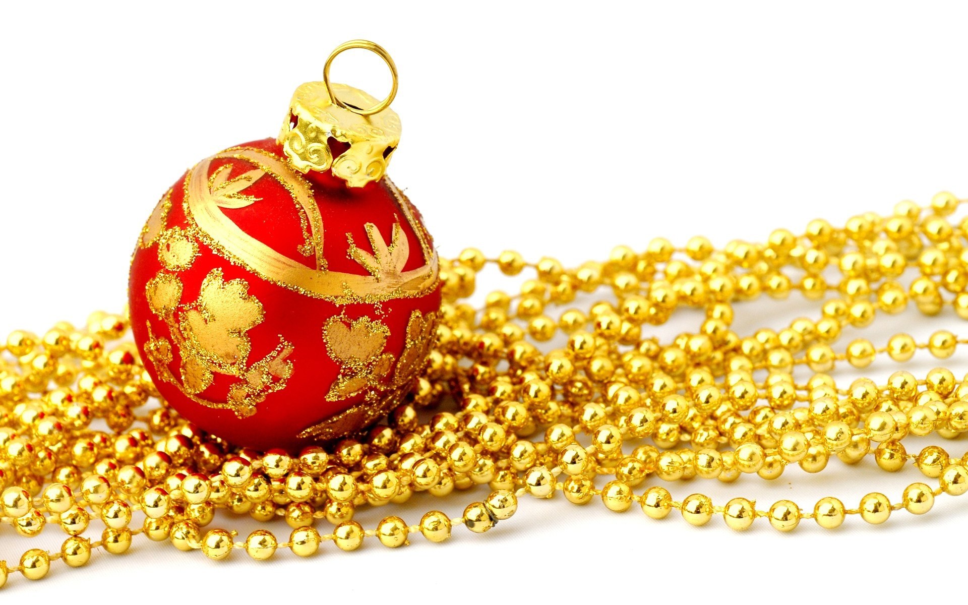 red ornament with gold beads