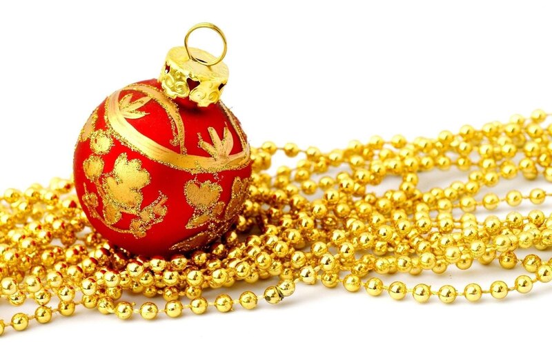 red ornament with gold beads
