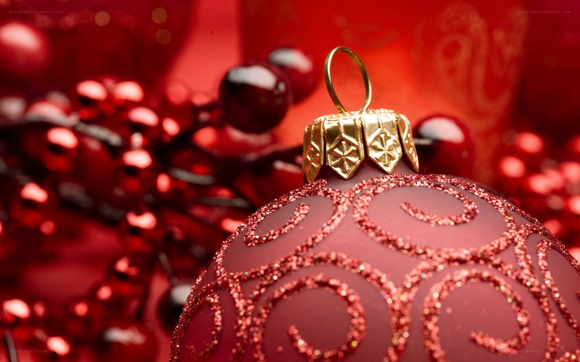 red ornament with gold cap