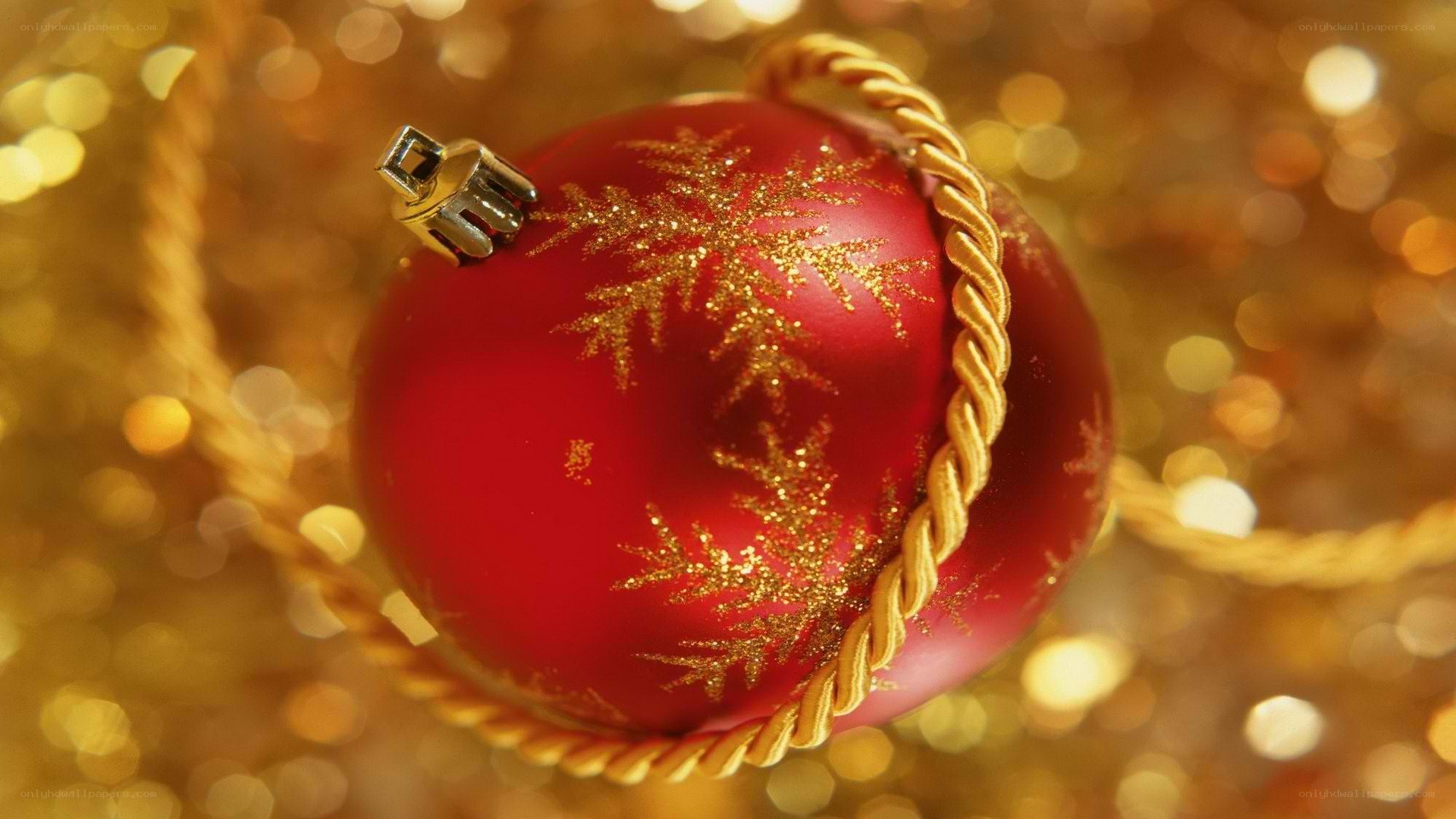 red ornament with gold snowflake