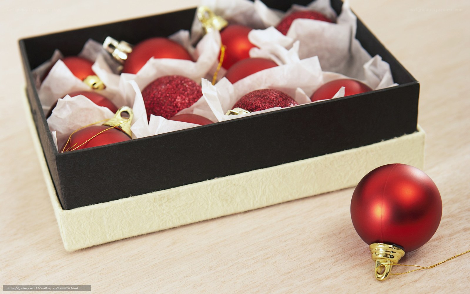 Red ornaments in a box