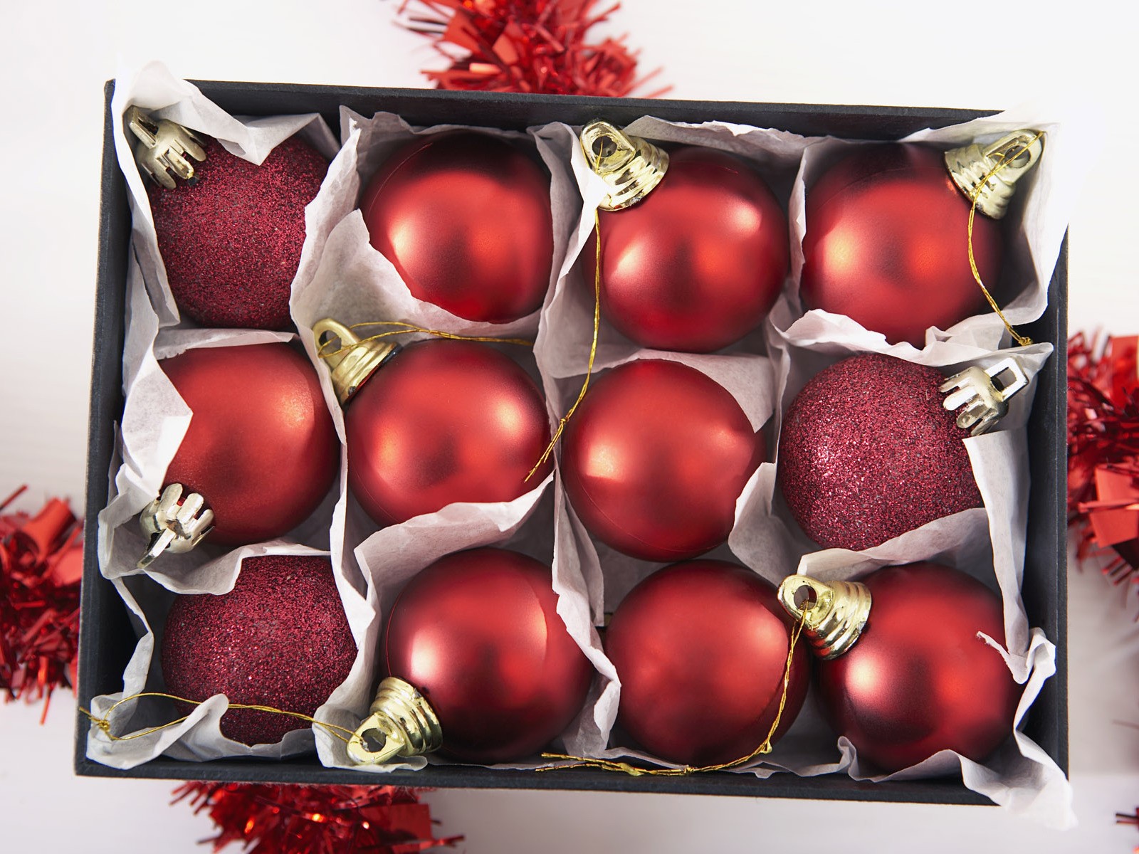 Red ornaments in a box