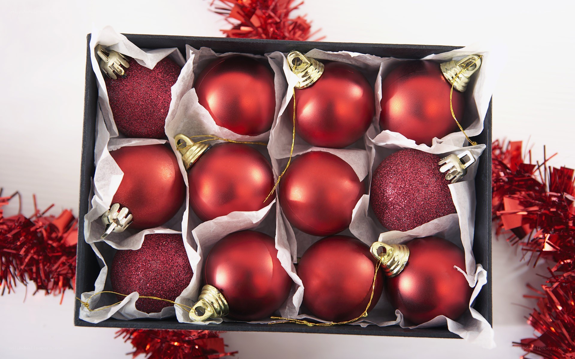 Red ornaments in a box