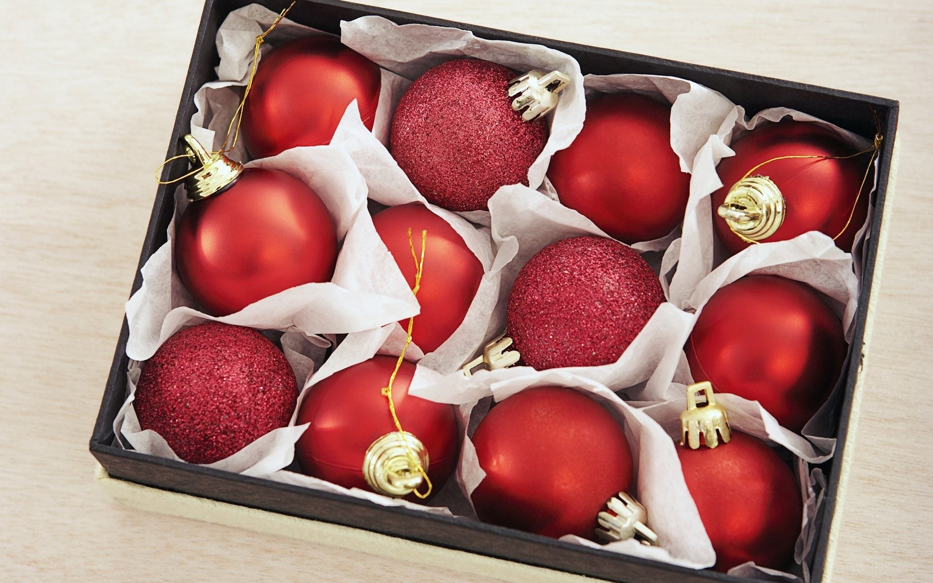 Red ornaments in a box