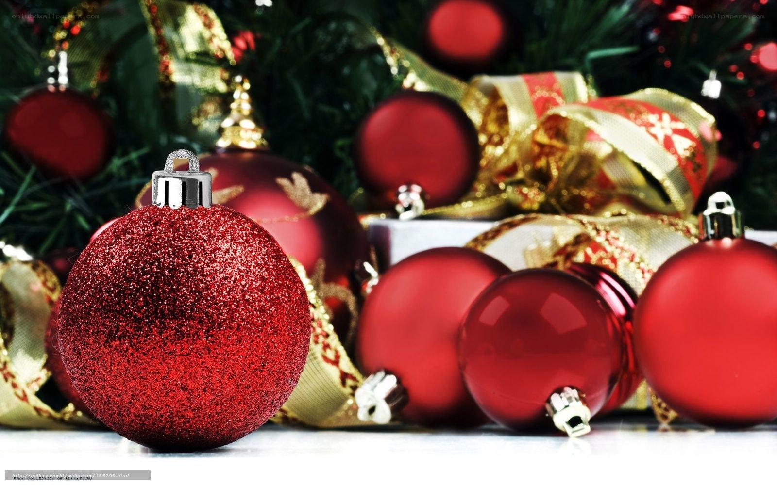 Red ornaments on Christmas tree