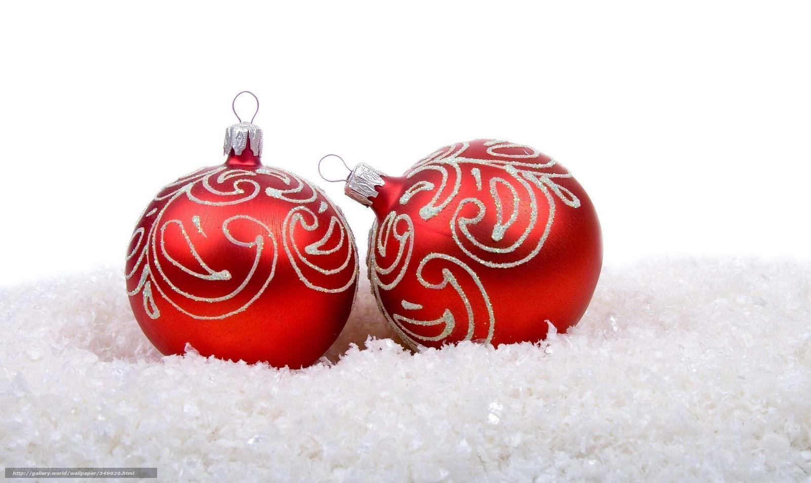 red ornaments on snow