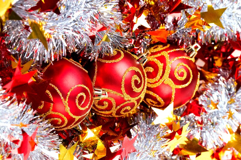 Red Ornaments on Tinsel — Festive, Winter, Photograph