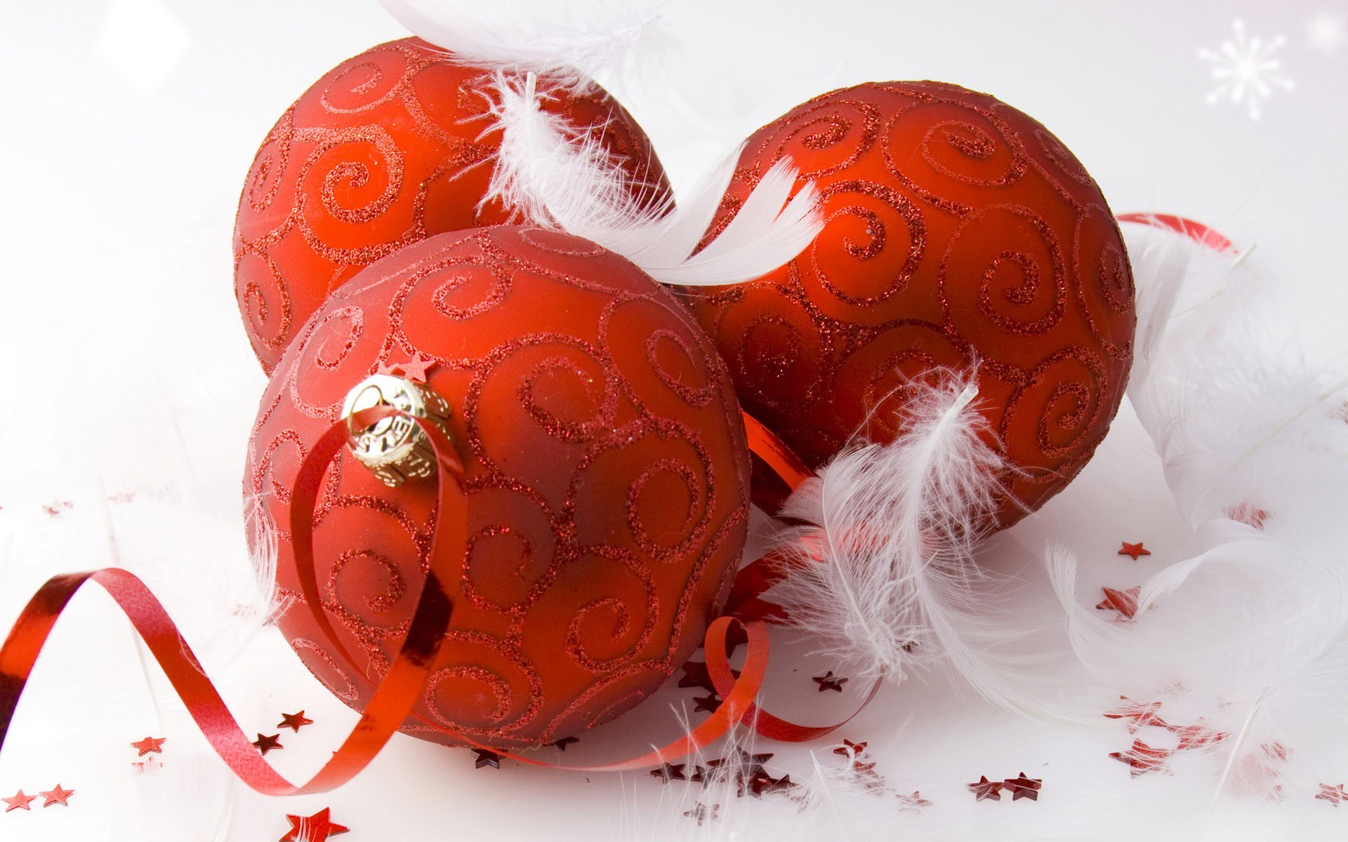 Red ornaments with feathers