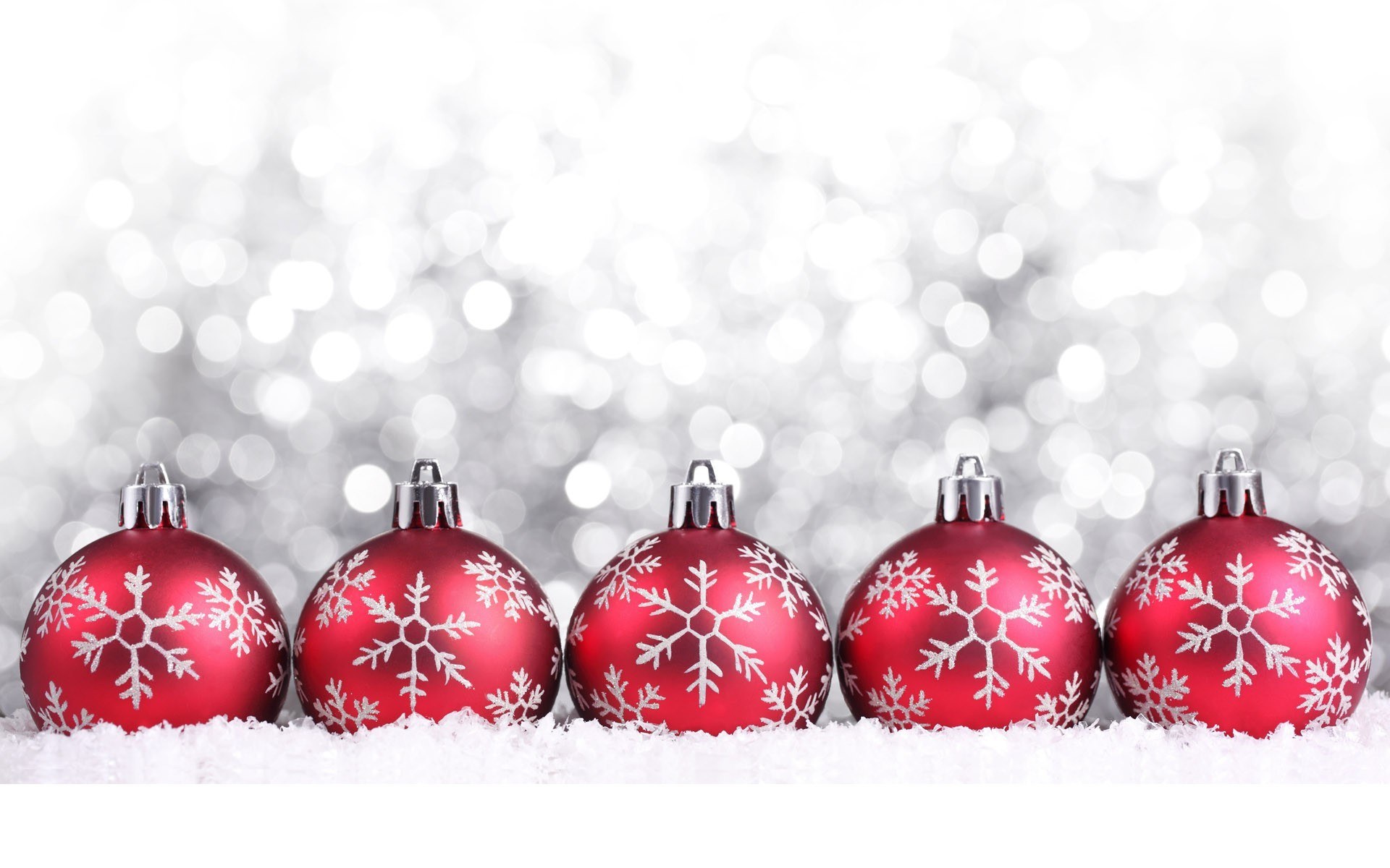 red ornaments with snowflakes