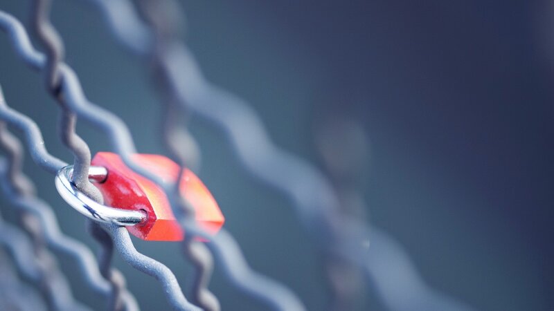 Red Padlock on Chain — Dramatic