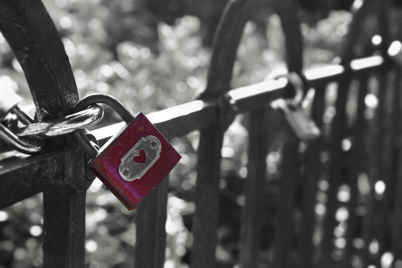 Red Padlock on Fence