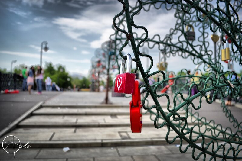 Red Padlocks on Metal Structure